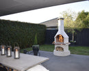 Buschbeck Rondo 3-in-1 Outdoor Fireplace at the outdoor backyard
