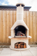 Buschbeck Rondo Outdoor Pizza with wood fence nackground