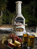 Buschbeck Rondo Outdoor Pizza as background by fruit and drink