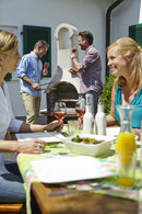 people using Buschbeck St Moritz 3-in-1 Outdoor Fireplace 