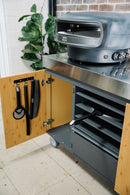 Everdure Pizza Station with pizza and tools