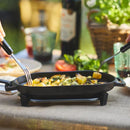 Ooni Cast Iron Sizzler with sizzling food