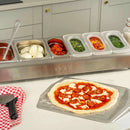 Ooni Pizza Topping Station with topping inside and pizza on the side